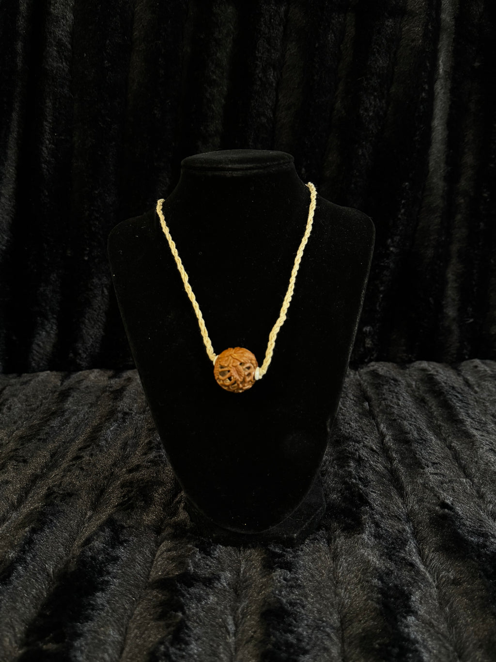 Unique nut carved pendant and cord necklace