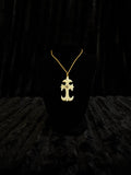 Cross design pendant on cord necklace